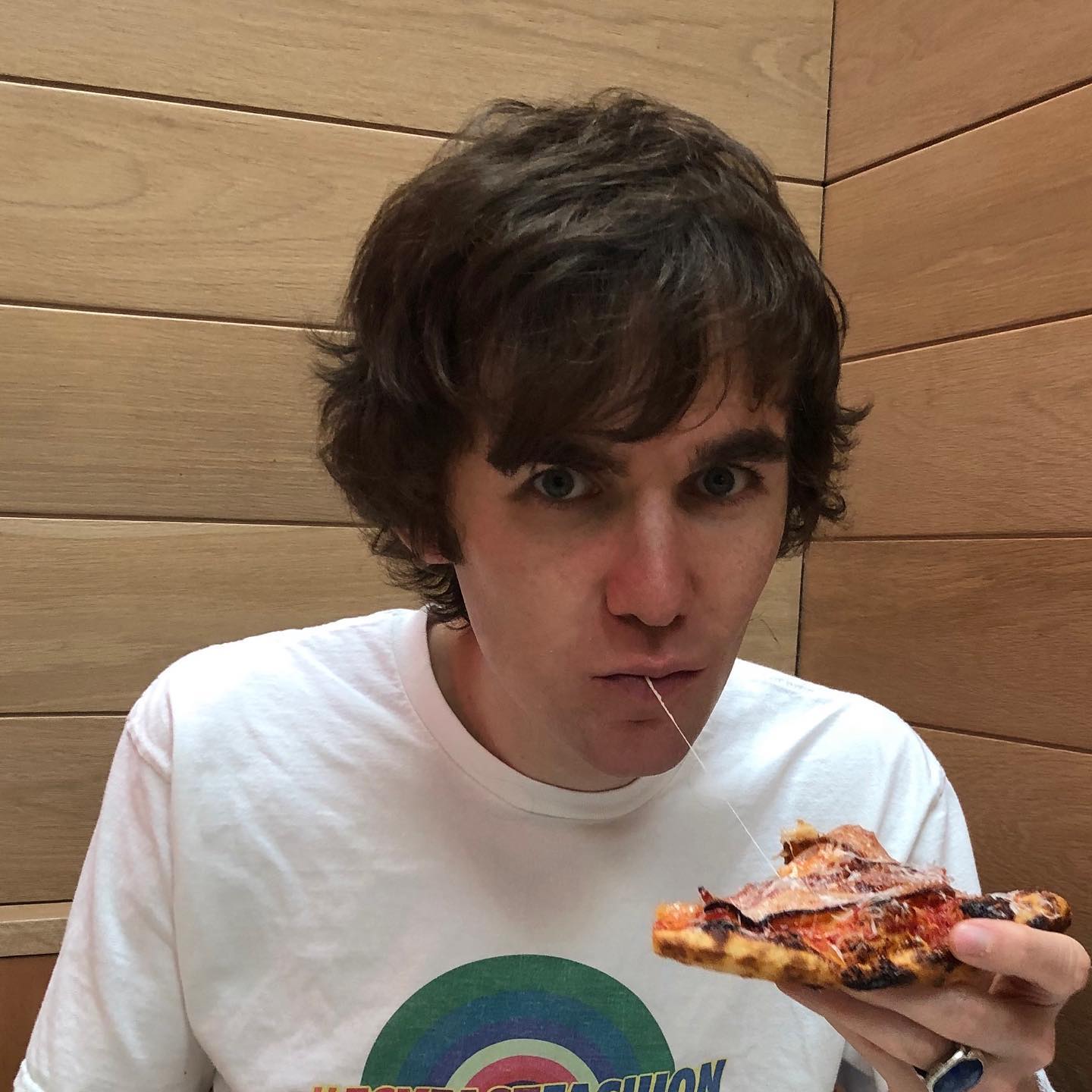 Tom Cridland Samples Pizza At Dominos For The Video And Song "Domino's At Midnight."