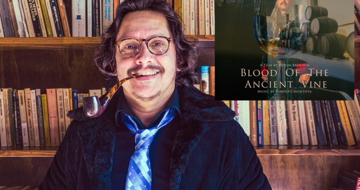 Composer Roberto Montoya with inset album cover for his "Blood Of The Ancient Vine" soundtrack